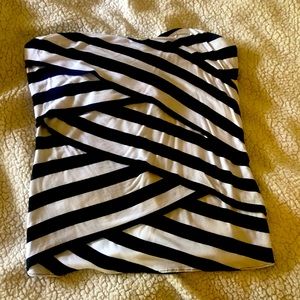White House Black Market asymmetrical black and white tube top.